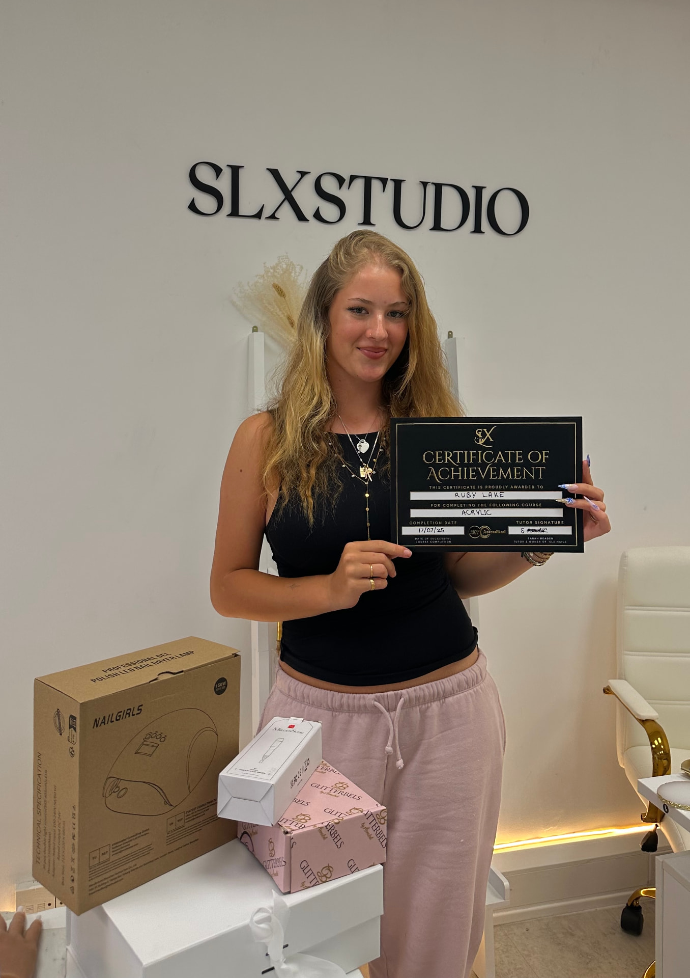 SLX Masterclass student with her certificate at SLX Studio