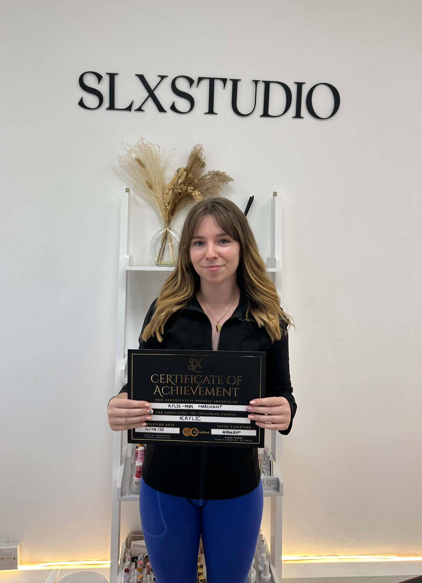 SLX Gel Builder student with certificate at SLX Studio